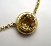 ../images/pendants/ChuckNash-gold-necklace-with-diamond.webp