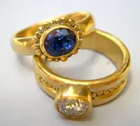 ../images/rings/Chuck-Nash-two-goldwdiamond.webp